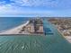 Aerial view of waterfront condo community near the beach at 7466 Bayshore Dr # 406, Treasure Island, FL 33706