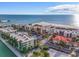 Aerial view of beachfront condo community with ocean access at 7466 Bayshore Dr # 406, Treasure Island, FL 33706