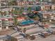 Aerial view of community pool and surrounding buildings at 7466 Bayshore Dr # 406, Treasure Island, FL 33706