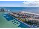 Aerial view of beachfront property with resort-style amenities at 7466 Bayshore Dr # 406, Treasure Island, FL 33706