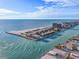 Aerial view of waterfront property and surrounding area at 7466 Bayshore Dr # 406, Treasure Island, FL 33706