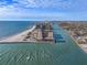 Aerial view of waterfront community and beach access at 7466 Bayshore Dr # 406, Treasure Island, FL 33706