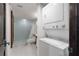 Bathroom with stackable washer and dryer at 7466 Bayshore Dr # 406, Treasure Island, FL 33706