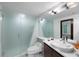 Modern bathroom with updated fixtures and a glass shower at 7466 Bayshore Dr # 406, Treasure Island, FL 33706