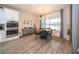 Kitchen dining area with a round table and chairs, overlooking a lake at 7853 Roma Dune Dr, Wesley Chapel, FL 33545