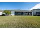 Single-Gathering home with screened porch and lush lawn at 7853 Roma Dune Dr, Wesley Chapel, FL 33545