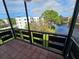 Relaxing screened balcony overlooking a peaceful pond and trees at 7975 58Th N Ave # 402, St Petersburg, FL 33709