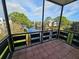 Enjoy a relaxing view of the pond and lush landscaping from your screened balcony at 7975 58Th N Ave # 402, St Petersburg, FL 33709