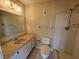 Bathroom with shower, toilet, and vanity at 7975 58Th N Ave # 402, St Petersburg, FL 33709