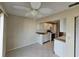 Open dining area adjacent to kitchen and balcony at 7975 58Th N Ave # 402, St Petersburg, FL 33709