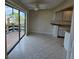 Dining area with access to a balcony overlooking a lake at 7975 58Th N Ave # 402, St Petersburg, FL 33709