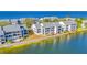 Aerial view of waterfront condos with a beautiful view at 813 Bahia Del Sol Dr # 33, Ruskin, FL 33570