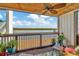 Relaxing balcony with water views, ceiling fan and comfy seating at 813 Bahia Del Sol Dr # 33, Ruskin, FL 33570