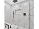 Bathroom with walk-in shower and marble tile at 813 Bahia Del Sol Dr # 33, Ruskin, FL 33570