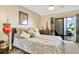 Spacious bedroom with a queen-size bed and lots of natural light at 813 Bahia Del Sol Dr # 33, Ruskin, FL 33570