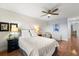 Spacious bedroom with hardwood floors and ceiling fan at 8186 Terrace Garden N Dr # 604, St Petersburg, FL 33709