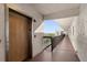 Building hallway with elevator access and outdoor views at 8186 Terrace Garden N Dr # 604, St Petersburg, FL 33709