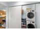 Convenient laundry closet with stackable washer and dryer at 8186 Terrace Garden N Dr # 604, St Petersburg, FL 33709