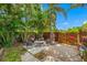 Relaxing patio with seating area and wooden fence at 8296 15Th N Way, St Petersburg, FL 33702