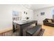 Dining area with modern pool table and attached seating at 8919 N River Rd, Tampa, FL 33635