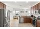 Spacious kitchen featuring stainless steel appliances and ample cabinetry at 8919 N River Rd, Tampa, FL 33635