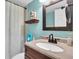 Clean bathroom with updated vanity and fixtures at 90 S Highland Ave # 12, Tarpon Springs, FL 34689