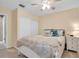 Bright bedroom with a cozy bed and ample closet space at 90 S Highland Ave # 12, Tarpon Springs, FL 34689