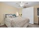 Guest bedroom with a queen bed and built-in closet at 90 S Highland Ave # 12, Tarpon Springs, FL 34689