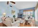 Light and airy living room with hardwood floors at 90 S Highland Ave # 12, Tarpon Springs, FL 34689