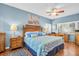 King-size bedroom with hardwood floors and ensuite bathroom at 90 S Highland Ave # 12, Tarpon Springs, FL 34689