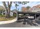 Covered carport parking for residents at 90 S Highland Ave # 12, Tarpon Springs, FL 34689