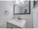 Clean bathroom with updated vanity and mirror at 9209 Seminole Blvd # 138, Seminole, FL 33772