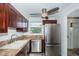 Modern kitchen with stainless steel appliances and granite countertops at 9209 Seminole Blvd # 138, Seminole, FL 33772