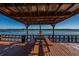 Scenic lake view from a covered wooden deck at 9209 Seminole Blvd # 138, Seminole, FL 33772