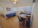 Bright bedroom with a small office area and a small round table at 1004 E 22Nd Ave, Tampa, FL 33605