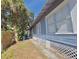 Side view of house with walkway and wooden fence at 1004 E 22Nd Ave, Tampa, FL 33605