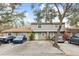 Two-story townhome with parking and landscaping at 10061 Lake Oak Cir, Tampa, FL 33624