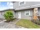 Front door entrance with landscaping at 10061 S Lake Oak Cir, Tampa, FL 33624