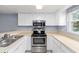 Kitchen with stainless steel appliances at 10061 Lake Oak Cir, Tampa, FL 33624