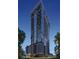 Modern high-rise building with sleek glass and metal design at 1101 E Jackson St # 1808, Tampa, FL 33602