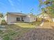 Home's backyard with a patio and stone pathway at 1103 S Prospect Ave, Clearwater, FL 33756
