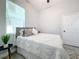 Cozy bedroom featuring a bed and natural light at 1103 S Prospect Ave, Clearwater, FL 33756