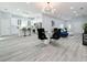 Modern kitchen with white shaker cabinets and stainless steel appliances at 1103 S Prospect Ave, Clearwater, FL 33756