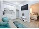 Modern kitchenette with white cabinets and a convenient wet bar at 1103 S Prospect Ave, Clearwater, FL 33756