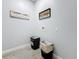 Laundry room with washer and dryer hookups, and built in shelving at 1103 S Prospect Ave, Clearwater, FL 33756