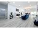 Spacious living room with fireplace and blue sofa at 1103 S Prospect Ave, Clearwater, FL 33756