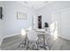 Home office features wood-look floors and a white desk at 1103 S Prospect Ave, Clearwater, FL 33756