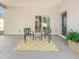Relaxing patio with seating area, view of kitchen, and access to backyard at 1103 S Prospect Ave, Clearwater, FL 33756