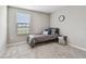 Small bedroom with gray carpet and a single bed at 11127 Hudson Hills Ln, Riverview, FL 33579