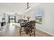 Casual dining area with table and chairs, adjacent to living room at 11127 Hudson Hills Ln, Riverview, FL 33579